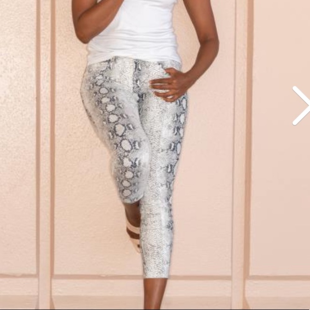 Snakeskin cropped skinnies